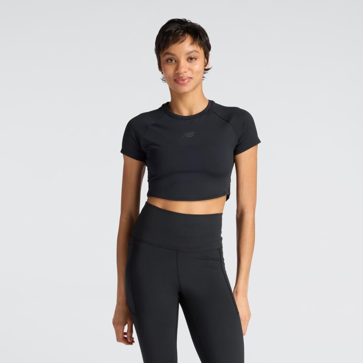 New Balance - Camiseta Crop de running de mujer Fast Days Fitted